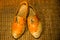 Old worn original Dutch clogs on a coconut mat in Enkhuizen