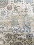 Old worn out elegant damask pattern carpet / floor covering. Luxury grunge vertical background