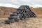 Old worn out tires on an abandoned trash dump. Garbage heap ready for disposal