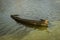 Old wrecked boat submerged in lake