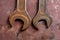 Old wrenches on rusty metal