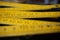 Old yellow folding meter ruler measuring centimeters