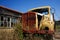 Old, yellow rusty truck on the abandoned farm