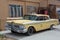 Old Yellow taxi parked in Seligman Arizona on July 31, 2011. Unidentified man