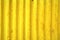 Old yellow vintage corrugated metal background and texture surface pattern