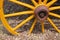 Old yellow wagon wheel