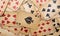 Old yellowed poker cards. background or texture