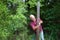 Older adult man repairing fence