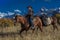 Older Cowboy leads packhorse across historic Last Dollar Ranch o