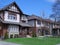 older detached brick and stucco houses with gables