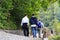 Older Hasidic Jews walk in the park during the Jewish New Year in Uman, Ukraine. Religious Jew