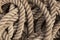 Older intricate marine ropes closeup.