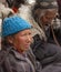 Older ladakhi women in traditional clothes and jewelry among the crowd of observers watching buddhist Yuru Kabgyat festival