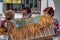 Older ladies doing bobbin lace in Vejer de la Frontera, Spain