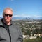 Older man on top of Los Angeles overlook