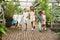 Older sister with younger brother and sisters on excursion in the garden