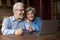 Older spouses use laptop and credit card enjoy e-commerce services