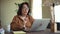 Older woman give online video lesson through laptop at home. Mature 50s tutor teacher make video