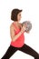 Older woman medicine ball by chest side