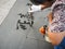 Older woman practicing water calligraphy