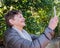 Older woman taking selfie outdoors