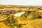 Oldman river flowing through the badlands