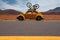 Oldtimer beetle car on the road in the desert