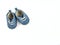 oldâ€‹ second handâ€‹ blueâ€‹ shoes orâ€‹ sneakers forâ€‹ kids orâ€‹ babyâ€‹ onâ€‹ whiteâ€‹ backgroundâ€‹ withâ€‹ copyâ€‹ space