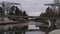 Olidebron Bridge and River Reflection in Canal near Innovatum, Trollhattan, Tilt Up