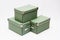Olive green storage boxes in a stack