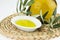 Olive oil Bottle and bowl plate with olive branch. Virgin olive oil. Natural olive oil, healthy food.