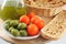 Olive oil, bread, olives, tomatoes