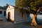 Olive tree and the church of Agios Ioannis Kastri at sunset, famous from Mamma Mia movie scenes, Skopelos Island