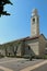 olive tree and the church tower of the small town called Lazise