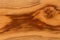 Olive Wood plank brown texture background on macro.