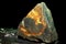 olivenit is a rare precious natural stone on a black background. AI generated.