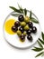 Olives fruits in plate on white backgrounds