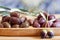 Olives on wooden background, kalamata, kalamon, green olives