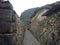 OLLANTAYTAMBO, PERU. Downtown of the small medieval city of Ollantaytambo, with Inca ruins on Andes Mountains