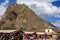 Ollantaytambo/Peru - Oct.02.19: touristic area of the historic city, craft stores and mountains on the back