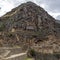 Ollantaytambo ruins, a massive Inca fortress with large stone terraces on a hillside, tourist destination in Peru