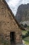 Ollantaytambo ruins, a massive Inca fortress with large stone terraces on a hillside, tourist destination in Peru