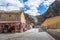 Ollantaytambo village, souvenir store and entrance to Inca Ruins and Terraces - Ollantaytambo, Sacred Valley, Peru