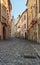 OLOMOUC, CZECH REPUBLIC-AUGUST 27, 2017: A narrow and winding street in the old town of Olomouc. Czech Republic. Summer morning vi