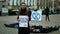 OLOMOUC, CZECH REPUBLIC, JANUARY 10, 2019: Extinction rebellion activist Anna Martinkova banner symbol circle hourglass