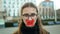 OLOMOUC, CZECH REPUBLIC, JANUARY 10, 2019: Extinction rebellion activist girl protest Anna Martinkova sealed mouth with