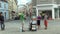 OLOMOUC, CZECH REPUBLIC, JULY 5, 2018: Jehovahs Witnesses religious society, two young women on the street offer books