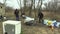 Olomouc, Czech Republic, March 20, 2018: Homeless people collect on carriage cart carry plastic garbage, wood, and