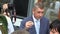 OLOMOUC, CZECH REPUBLIC, MAY 15 , 2018: Czech Prime Minister Andrej Babis comes in Olomouc Region, man and woman in