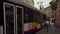 Olomouc, Czech Republic - May 2019: two trams passing through old street